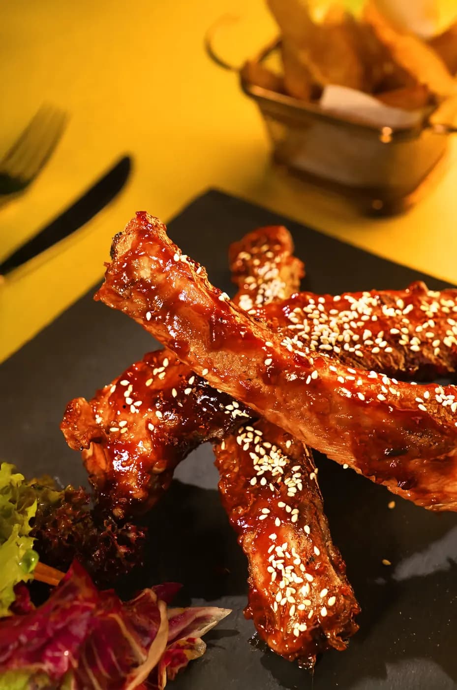 Glazed ribs with sesame on a stone board, Hilton Garden Inn Danang