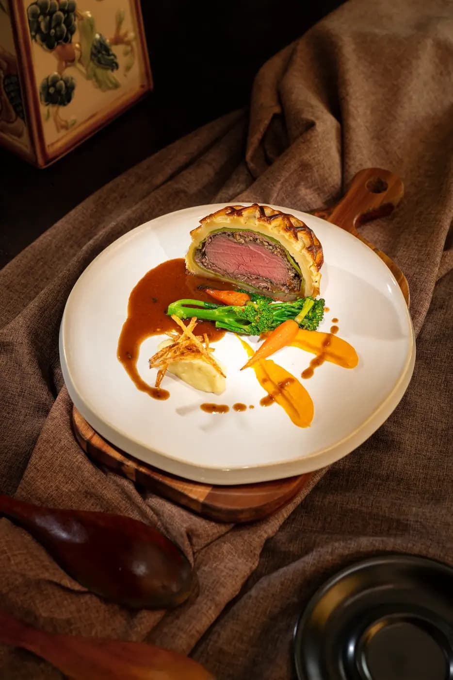 Beef Wellington on a patterned china plate, Xi Nê Bistro & Jazz